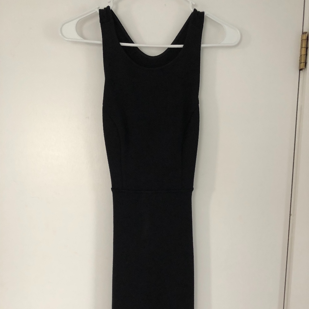 Black body-con with cut outs in the back
